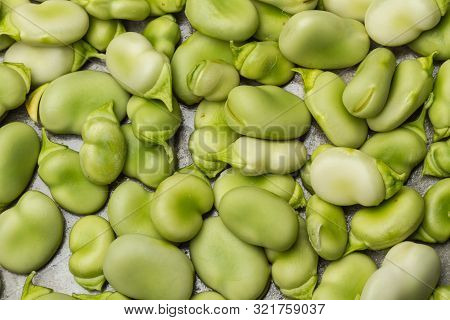 Raw Broad Beans On A Marble Table