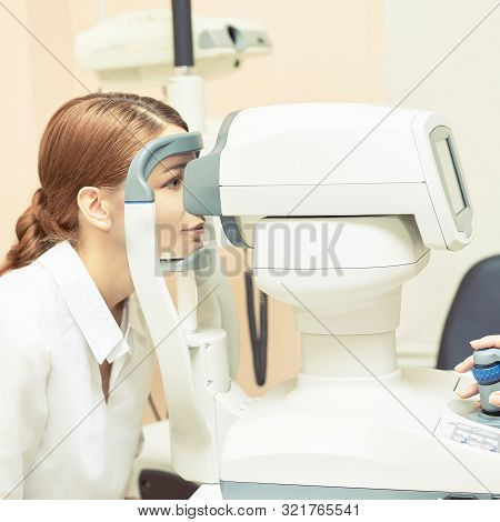 Eye Ophthalmologist Exam. Eyesight Recovery. Astigmatism Check Concept. Ophthalmology Diagmostic Dev