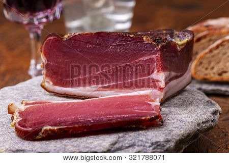 Closeup Of South Tyrolean Speck On Granite