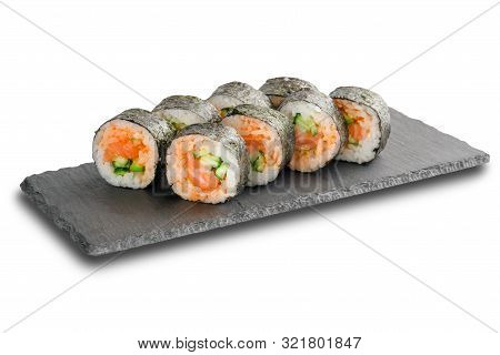 Sushi Rolls With Salmon And Cucumber Wrapped In Nori Leaf On Black Slate Or Stone Shale Surface Isol