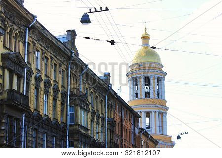 City Street With Old Houses And Vladimirskaya Church In Saint Petersburg, Russia. Close Up Buildings