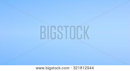 Bright Blue Sky Background Of Soft Bluish Tone. Sky View Banner With Empty Copy Scape