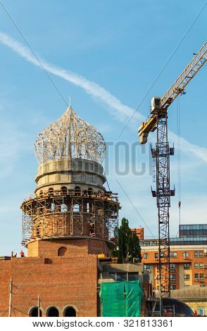 Building Church With Crane On Blue Sky Background View Elements Of The Building And The Dome