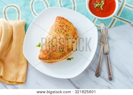 Italian Pastry Pepperoni And Cheese Calzone With Tomato Marinara Dipping Sauce