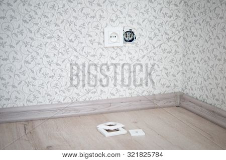 Unrepaired Electrical Outlet In The Wall In The New Apartment