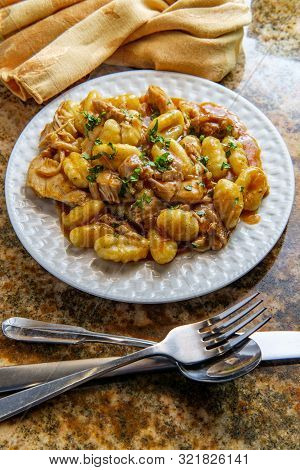 Hungarian Chicken Paprikash With Gnocchi Potato Dumplings And Basil