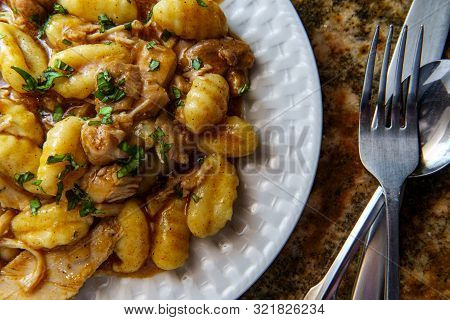Hungarian Chicken Paprikash With Gnocchi Potato Dumplings And Basil