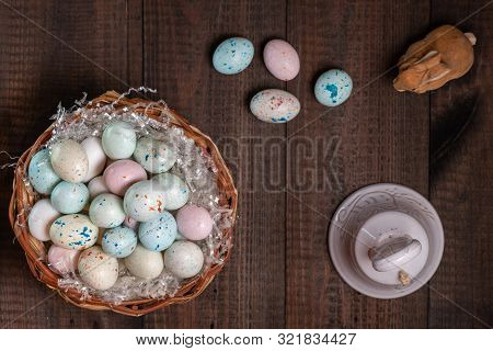 Basket Full Of Easter Eggs And Bell
