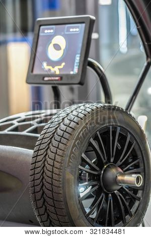 Mosocw, Russia - September, 6, 2019: the image of a tyre repair machine in a car repair station in Mosocw, Russia