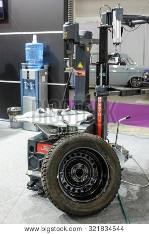 Mosocw, Russia - September, 6, 2019: the image of a tyre repair machine in a car repair station in Mosocw, Russia