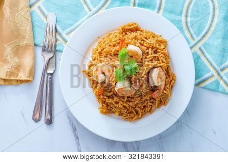 Tail-on Shrimp Spanish Rice With Vermicelli Pasta On Marble Kitchen Table