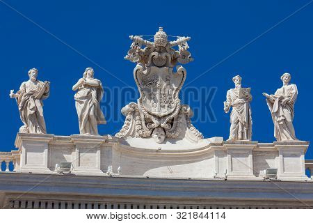 Detail Of The Chigi Coats Of Arms And The Statues Of Saints That Crown The Colonnades Of St. Peter S