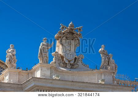 Detail Of The Chigi Coats Of Arms And The Statues Of Saints That Crown The Colonnades Of St. Peter S