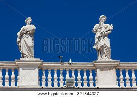 Detail Of The Statues Of Saints That Crown The Colonnades Of St. Peter Square Built On 1667 On The V