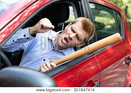Angry Driver With Baseball Bat Screaming Out Of Car Window