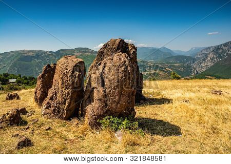 Big Stones On Meadow Near Village Resk In Albania