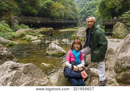 Happy Asian Senior Couple Having Vacation In China