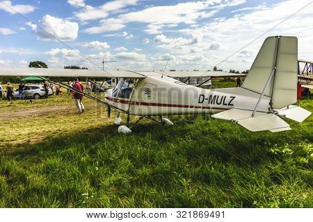 KALININGRAD, Russia - August 18, 2019: 100 Anniversary First European Airport Devau Fest, Ultra Light Propeller Screw Plane Ready for Flight