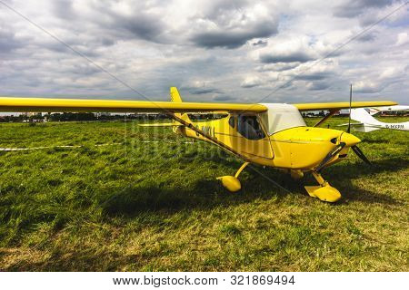 KALININGRAD, Russia - August 18, 2019: 100 Anniversary First European Airport Devau Fest, Ultra Light Propeller Screw Plane Ready for Flight