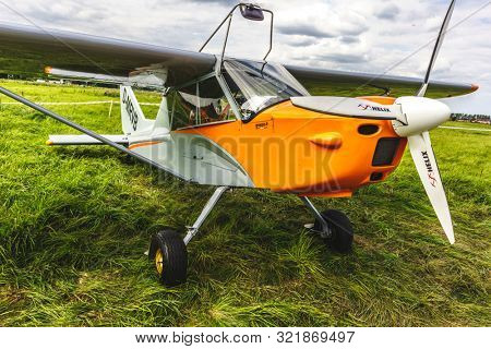 KALININGRAD, Russia - August 18, 2019: 100 Anniversary First European Airport Devau Fest, Ultra Light Propeller Screw Plane Ready for Flight