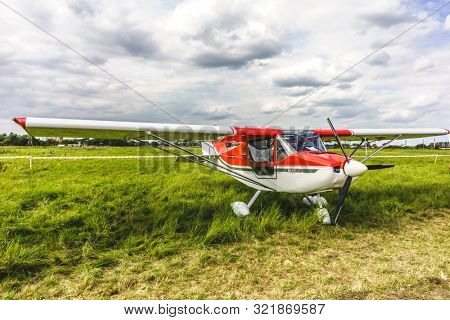KALININGRAD, Russia - August 18, 2019: 100 Anniversary First European Airport Devau Fest, Ultra Light Propeller Screw Plane Ready for Flight