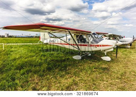 KALININGRAD, Russia - August 18, 2019: 100 Anniversary First European Airport Devau Fest, Ultra Light Propeller Screw Plane Ready for Flight