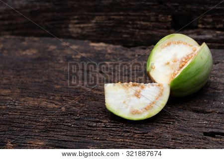 Thai Eggplant Or Solanum Xanthocarpum Good Vegetable On Wooden Background