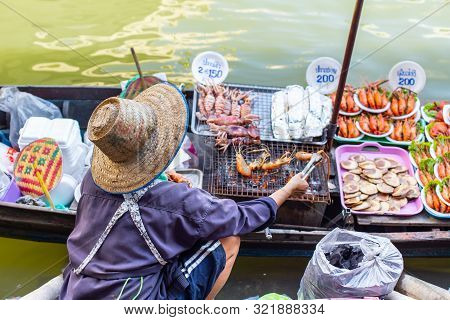 Amphawa Food Sale On Wooden Boat Traditional Mae Klong Canals River Market And Side Village Beautifu