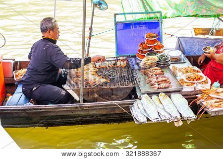 Amphawa Food Sale On Wooden Boat Traditional Mae Klong Canals River Market And Side Village Beautifu