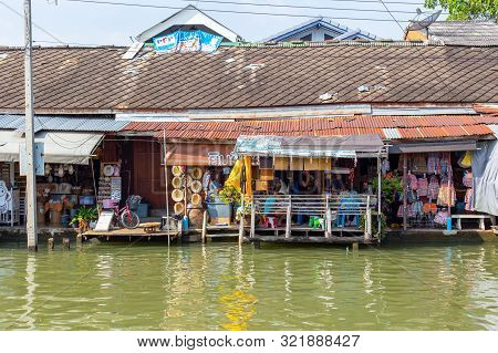 Amphawa Floating Market With Traditional Mae Klong River Side Village Around More Than 500 Years Can