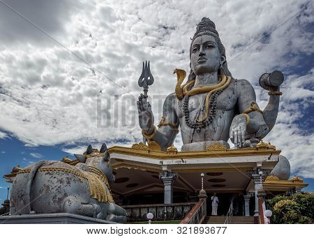 Shiva Statue And Gopuram Tower On The Coast Of The Arabian Sea In Murdeshwar, India