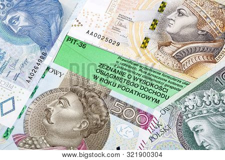 Polish Tax Information On A Background Of Banknotes