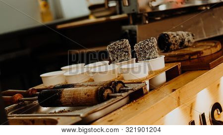 Cooking Of Trdelniks On The Grill At The Point Of Sale.