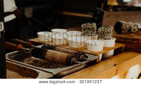 Cooking Of Trdelniks On The Grill At The Point Of Sale.