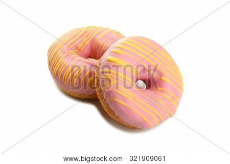 Sweet Doghnuts With Pink Glaze Decorated With Chocolate On A Paper Plate Isolated On A White Backgro