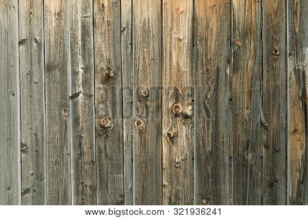 Dark Vintage Wooden Background With Bumps. Unpolished Board
