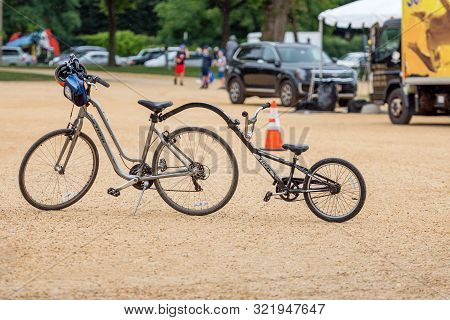 Washington Dc, Usa - June 9, 2019: Family Bike In The Park Near Capitol Building  At Washington Dc