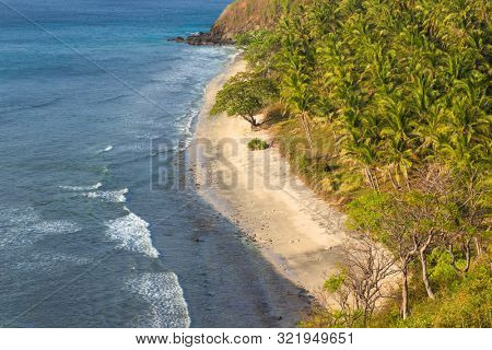 Beautiful landscape of Senggigi beach, Lombok island, scenic travel destination beach with crystal blue waters, Indonesia