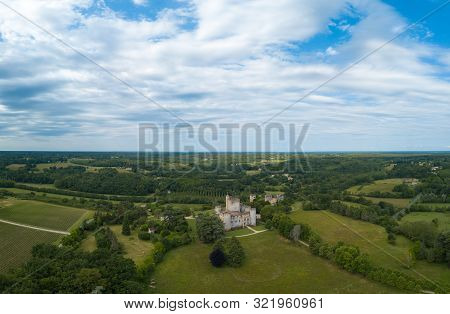Aerial View Of Ancient Fortified Castle Of Chateau De Roquetaillade In Sunny Summer Day, Mazeres, Fr