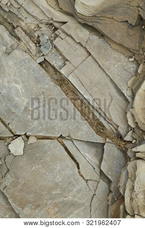 Rock Layers. Large Coarse Gray Layers Of Stone.