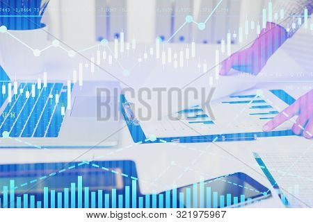 Unrecognizable Businesswoman Checking Stock Market Report At Office Table With Double Exposure Of Di