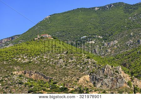 Bottom-up View Of Two Monasteries, Male And Female, In The Area Of Loutraki, On The Slope Of The Pic