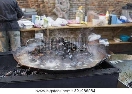 Fresh Mussels At Grill Pan. Seafood Barbecue Outdoors. Picnic Healthy Food, Mussels In Shells. Plent