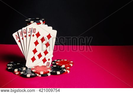 Poker Cards With Royal Flush Combination. Close-up Of Playing Cards And Chips In Poker Club. Free Ad
