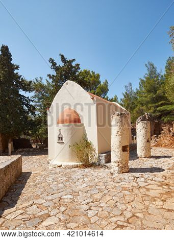 Rural Village Chapel On Crete Island With Belfry, Bell Tower. Travel Destination, Local Landmark.