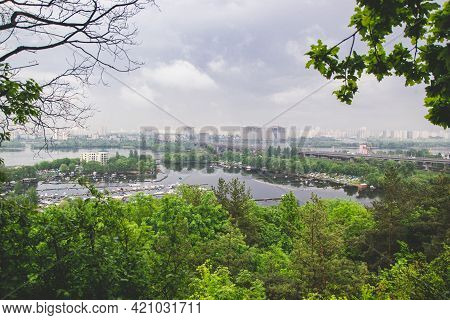 Kyiv, Ukraine - May 18, 2021: Landscape View Of The Left Side Of Kyiv On Dnipro River With Bright Gr