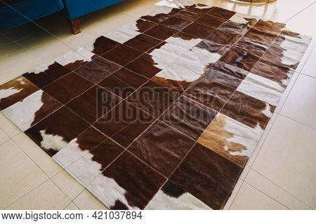 Handcrafted Cowhide Rug Designed By Country Men