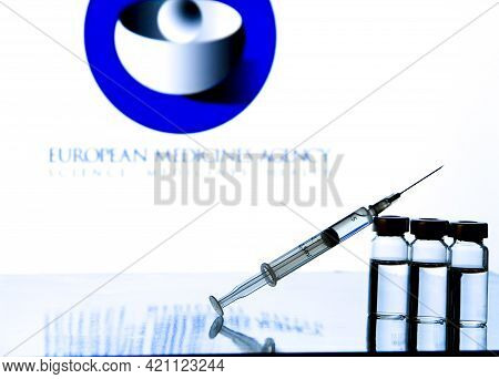 Madrid, Spain- February 20, 2021: Syringe And Vials With Covid-19 Vaccine And European Medicine Agen
