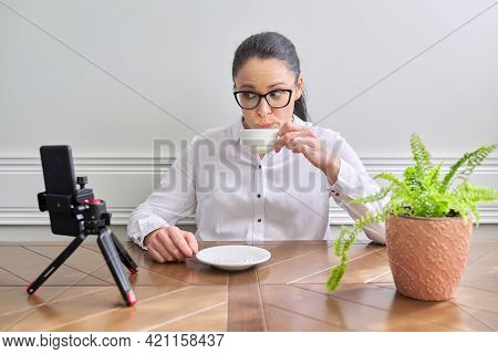 Young Woman Blogger Vlogger Recording Broadcast At Home