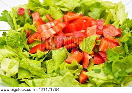 Fresh Raw Green Healthy Lettuce Salad In Glass Plate, Isolated On White Background